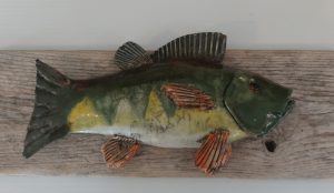 raku fish on wood